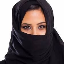 THE WOMAN BEHIND THE VEIL