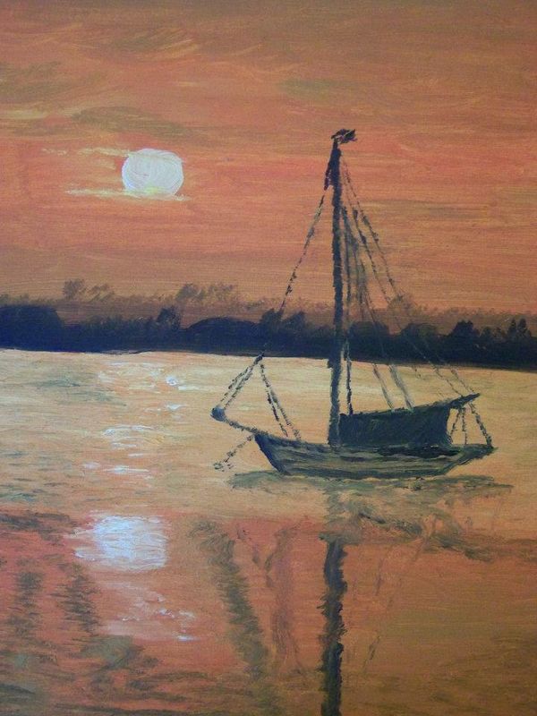 a boat on water at sunset