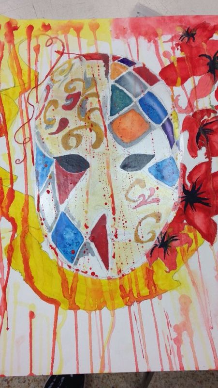 A mask a ribbon some flowers 