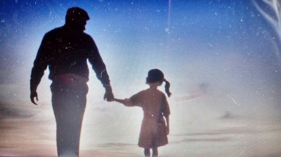 "THE MAN WITH THE CHILD IN HIS EYES"