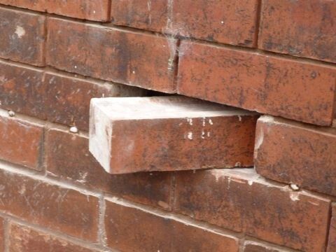 "Taking Down the Bricks"