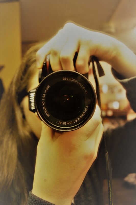 Photographer - a poetic "who done it?" riddle