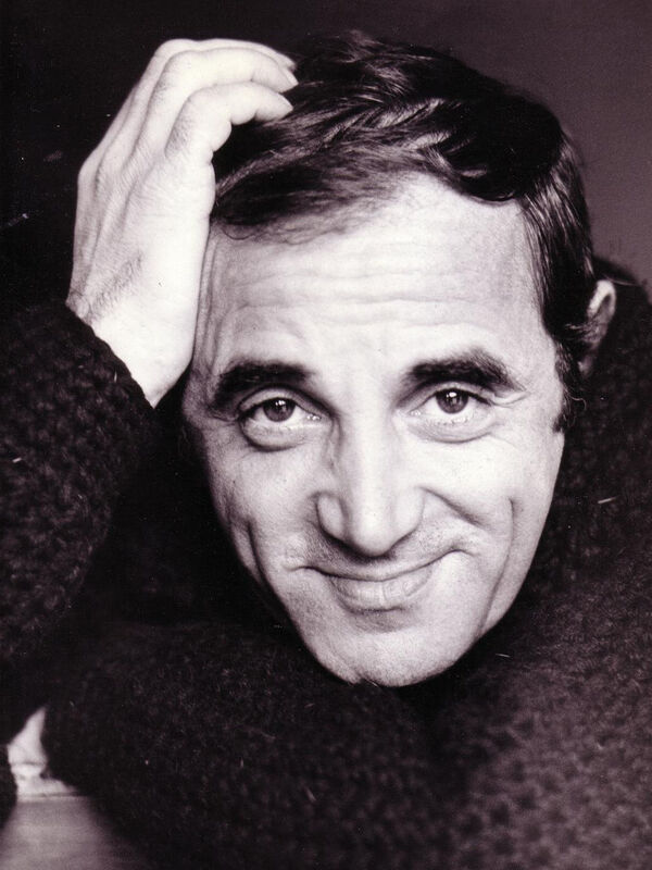 He.....(An Homage to Charles Aznavour's She)