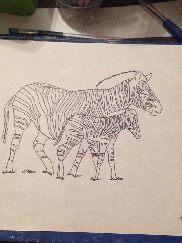 Zebra mare with her foal