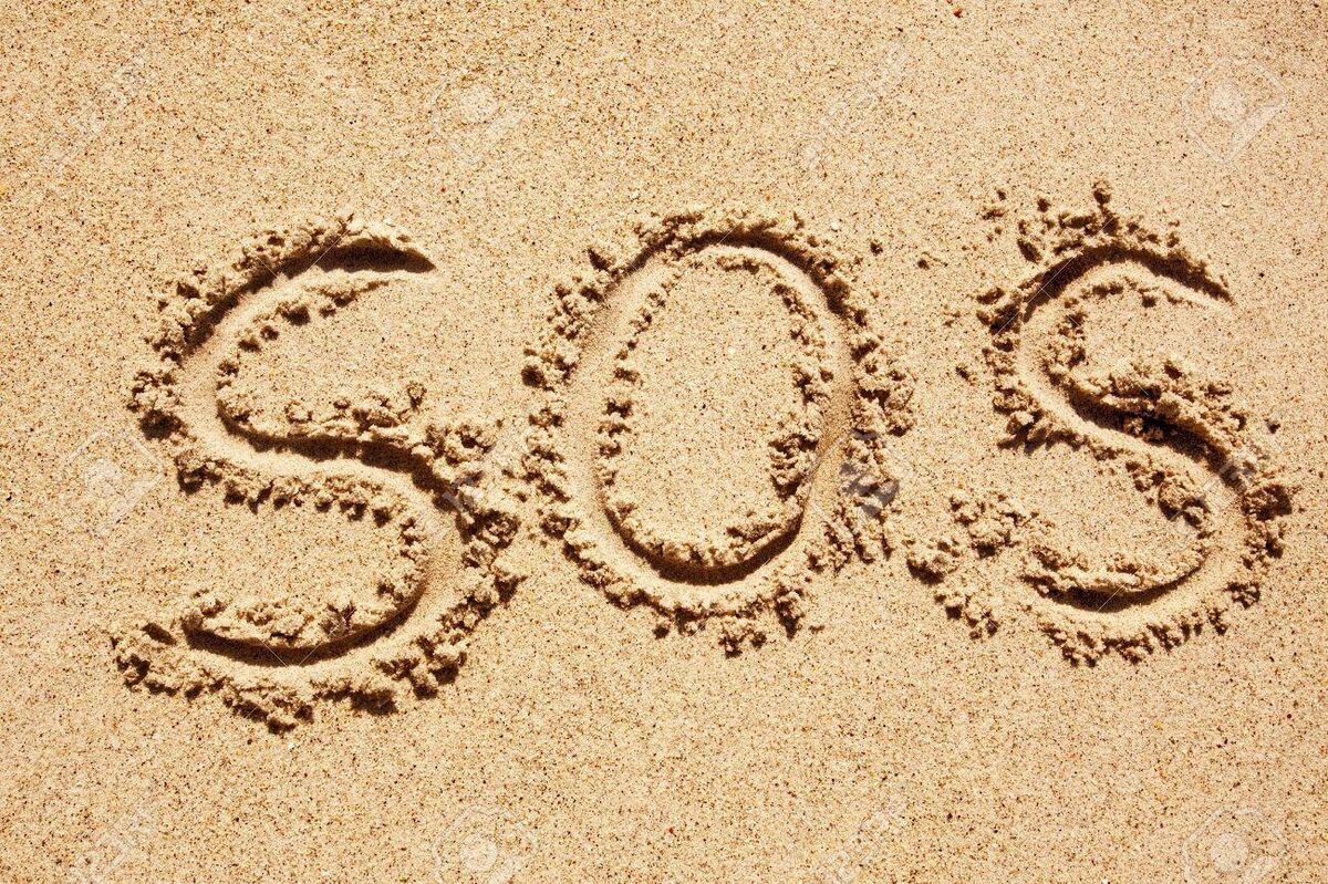 Writing SOS on the sand
