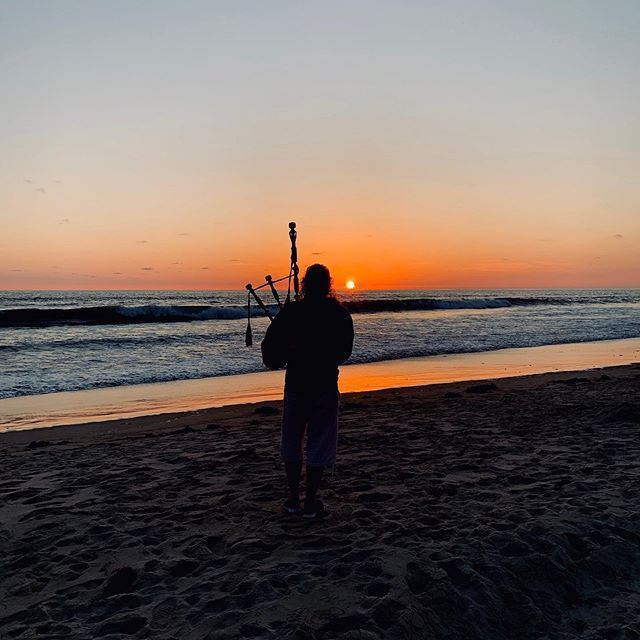 Yon Border Bagpiper on the seashore