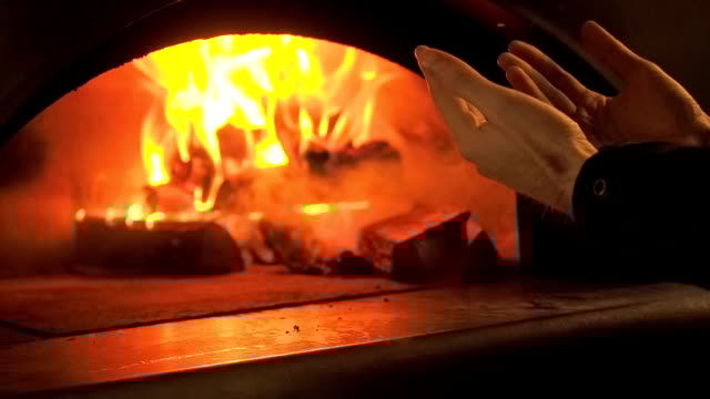 Warming her hands by the fire ❤️