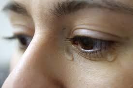 Thru a paroxysm of tears...