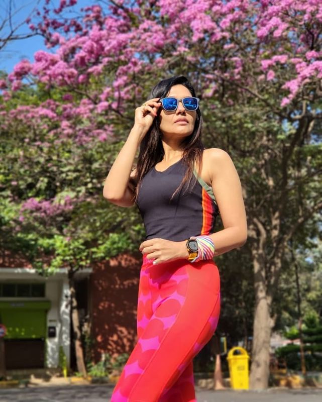 SHE WALKS WITH GRACE