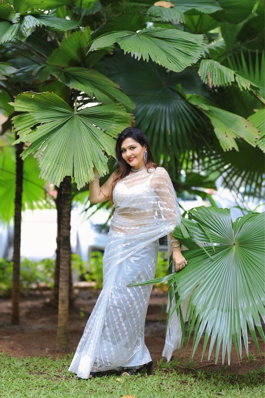 SHE DREAMS IN WHITE 