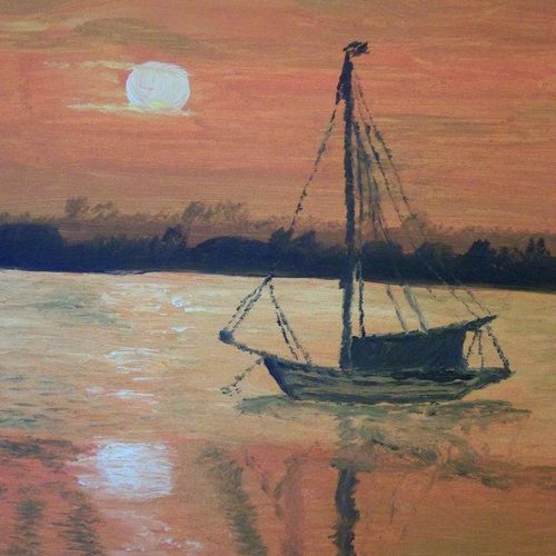 a boat on water at sunset