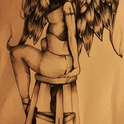 Angel on stool