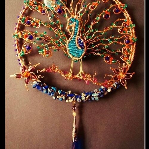 Peacock suncatcher