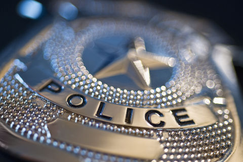MURDER BY THE BADGE