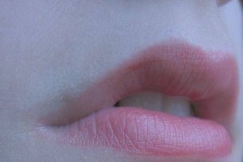 A woman&#039;s kiss