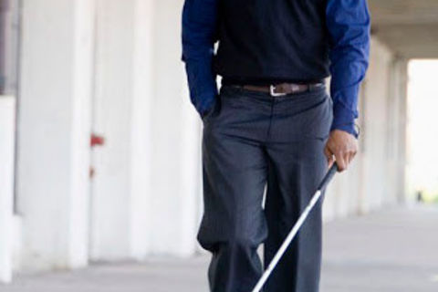 Man with a white cane 