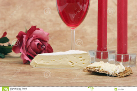 wine and rose and cheese and candles 