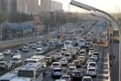 Morning Rush hour in Beijing (from a room at the Beijing Guangxi Hotel.) 