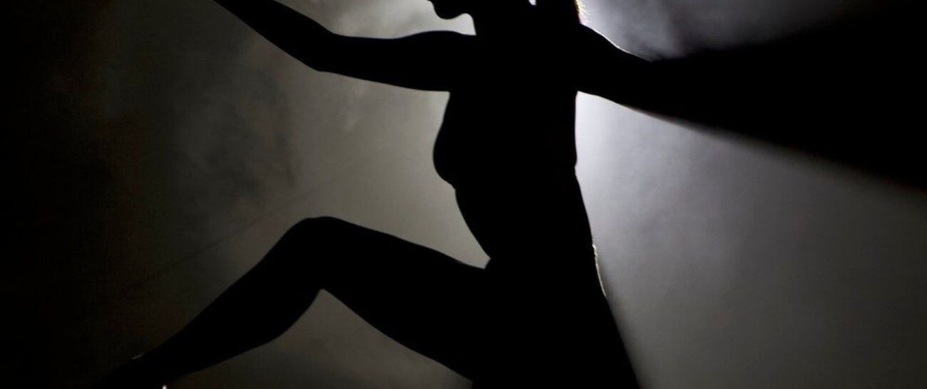 She dances with her shadow