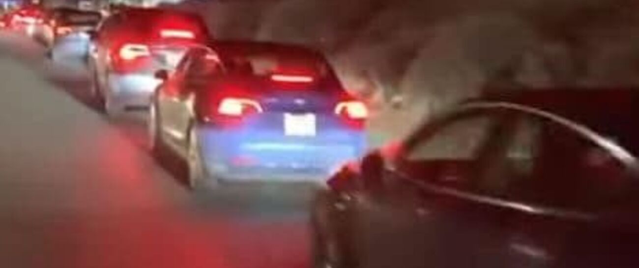 Three red cars